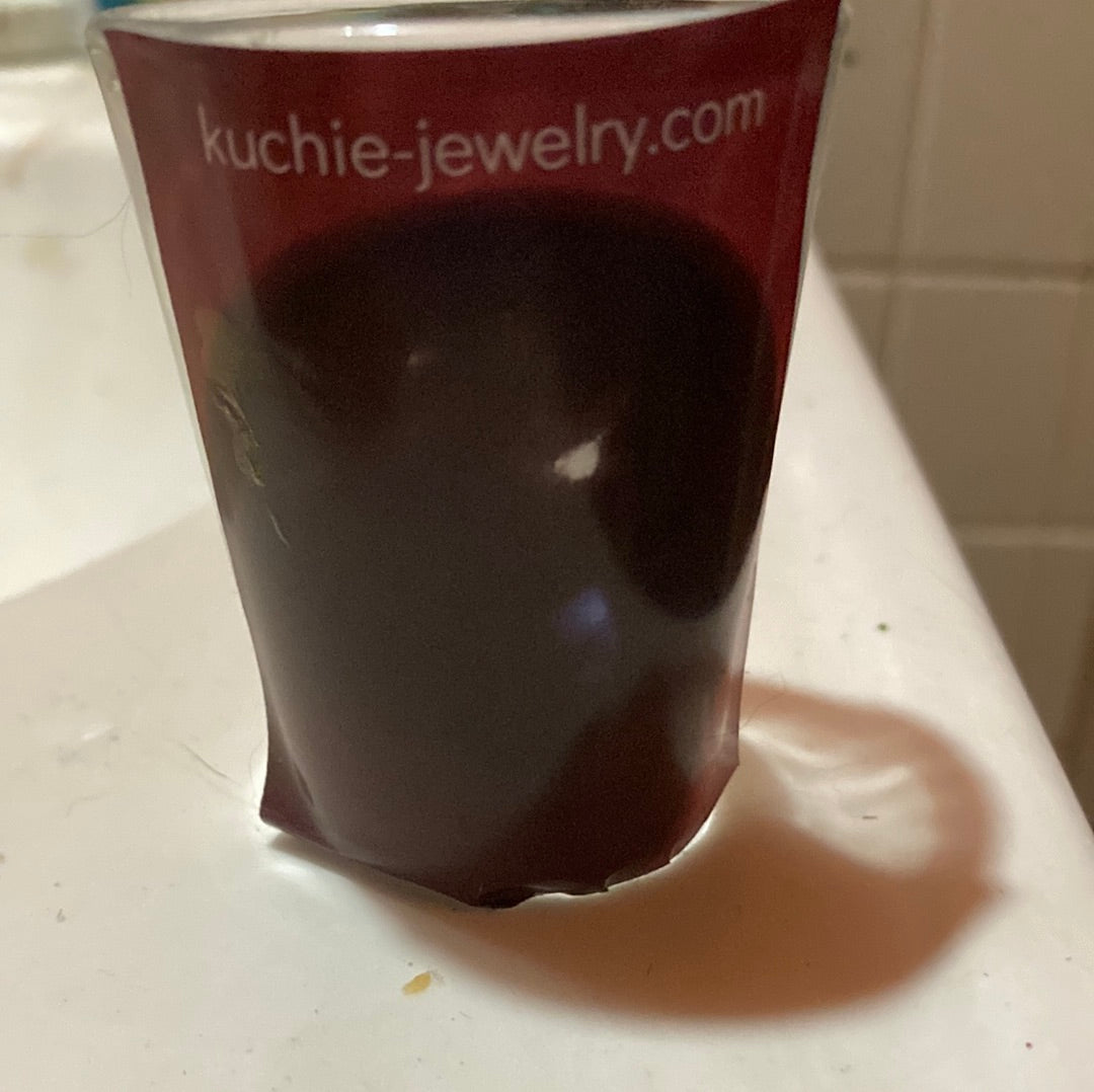 Fill shot glass with crystals